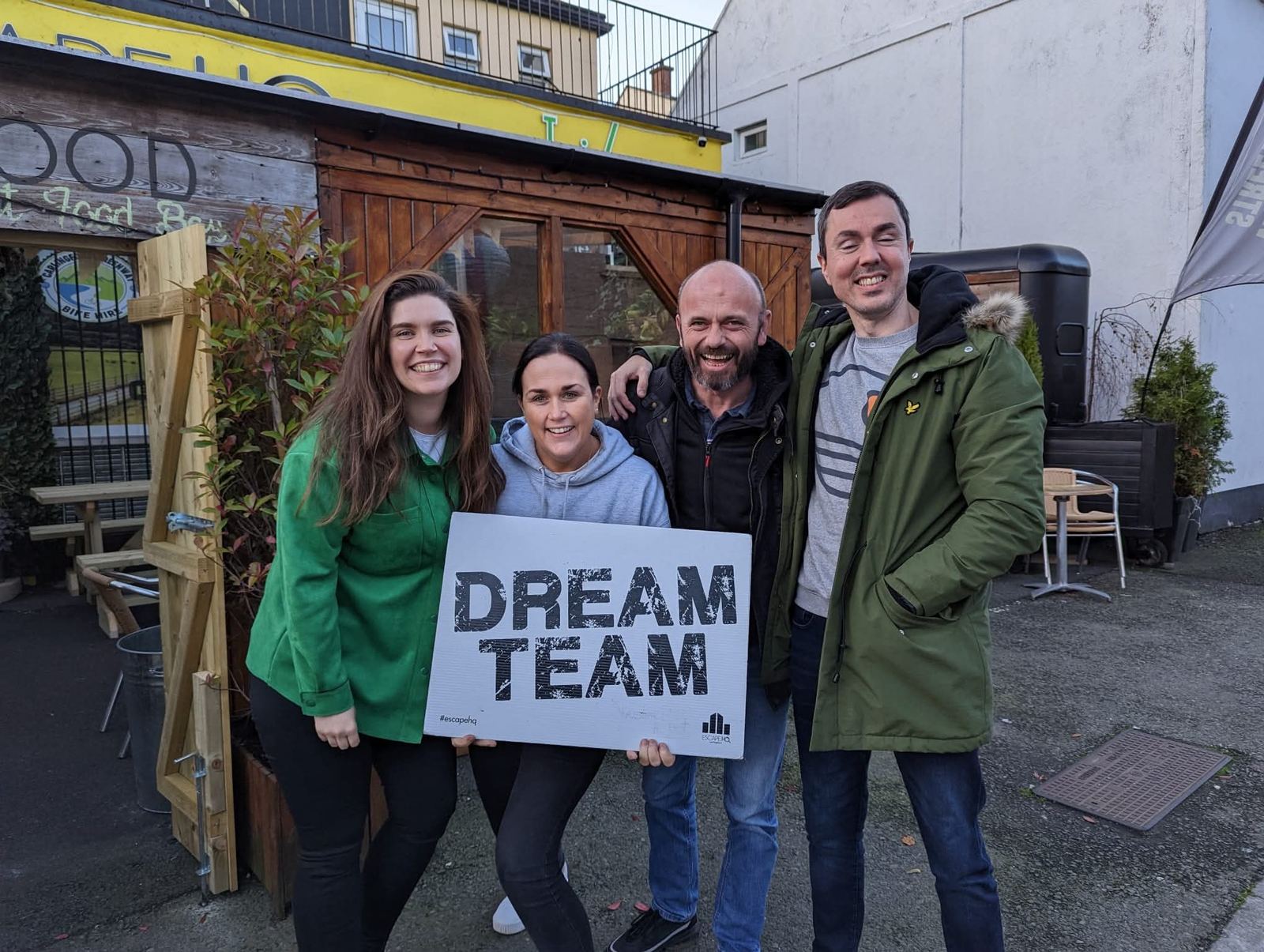 SMC colleagues holding a Dream Team sign